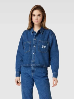 Zdjęcie produktu Bluzka jeansowa z kieszeniami na piersi Calvin Klein Jeans