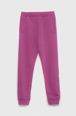 Zdjęcie produktu Fila spodnie dresowe dziecięce kolor fioletowy gładkie