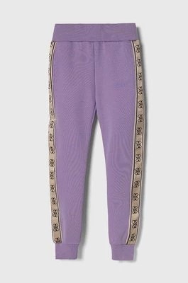 Zdjęcie produktu Guess spodnie dresowe dziecięce kolor fioletowy z aplikacją