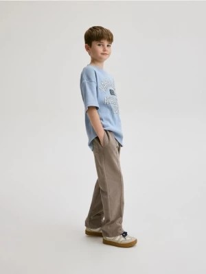 Zdjęcie produktu Reserved - Dresowe spodnie z przeszyciami - brązowy