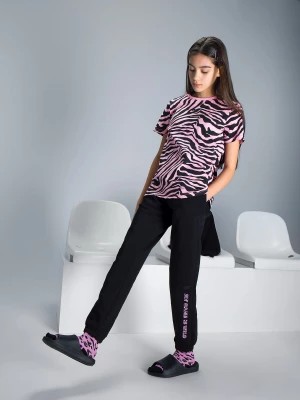 Zdjęcie produktu Spodnie dresowe joggery dziewczęce 4F