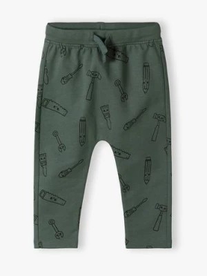 Zdjęcie produktu Zielone bawełniane spodnie dresowe niemowlęce we wzory 5.10.15.