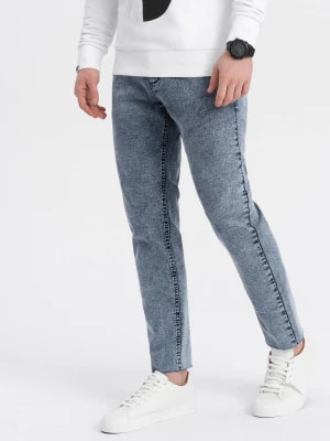 Zdjęcie produktu Męskie spodnie jeansowe marmurkowe z surowo wykończoną nogawką SLIM FIT - ciemnoniebieskie V4 OM-PADP-0146
 -                                    S