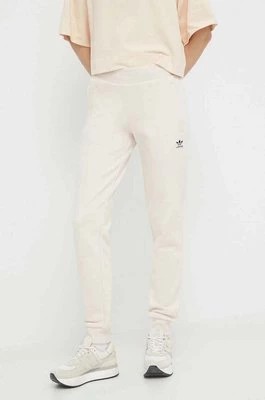 Zdjęcie produktu adidas Originals spodnie dresowe bawełniane kolor beżowy gładkie IA6477