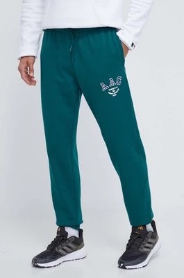 Zdjęcie produktu adidas Originals spodnie dresowe bawełniane kolor zielony z aplikacją