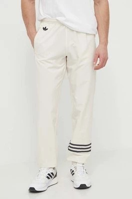 Zdjęcie produktu adidas Originals spodnie dresowe kolor beżowy z aplikacją IV5356