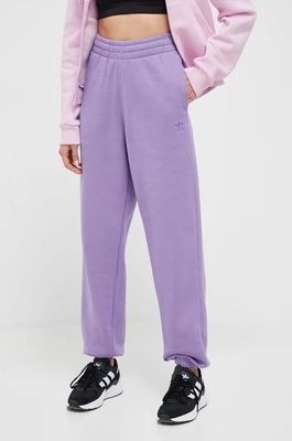 Zdjęcie produktu adidas Originals spodnie dresowe kolor fioletowy gładkie