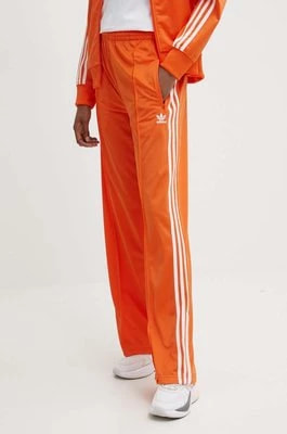 Zdjęcie produktu adidas Originals spodnie dresowe kolor pomarańczowy z aplikacją IP0640
