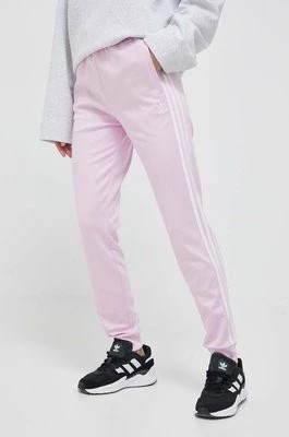 Zdjęcie produktu adidas Originals spodnie dresowe kolor różowy z aplikacją