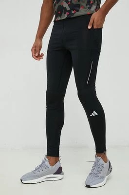 Zdjęcie produktu adidas Performance legginsy do biegania Own the Run męskie kolor czarny gładkie HM8444