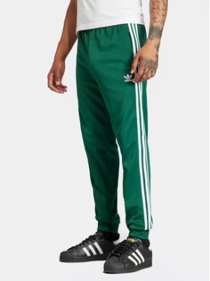 Zdjęcie produktu adidas Spodnie dresowe adicolor Classics SST IR9886 Zielony Slim Fit