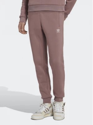 Zdjęcie produktu adidas Spodnie dresowe adicolor Essentials Trefoil HK0105 Różowy Slim Fit
