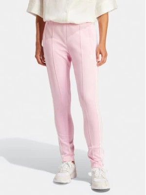 Zdjęcie produktu adidas Spodnie dresowe adicolor SST IR8076 Różowy Slim Fit
