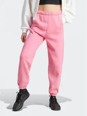 Zdjęcie produktu adidas Spodnie dresowe ALL SZN Fleece Washed IK4257 Różowy Loose Fit