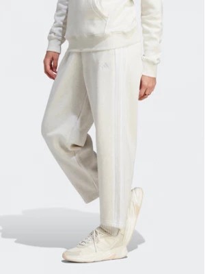 Zdjęcie produktu adidas Spodnie dresowe Essentials 3-Stripes Open Hem Fleece IM0248 Écru Loose Fit