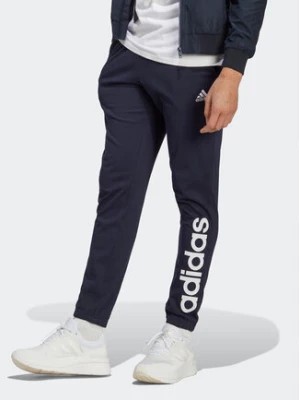 Zdjęcie produktu adidas Spodnie dresowe Essentials IC0056 Granatowy Regular Fit