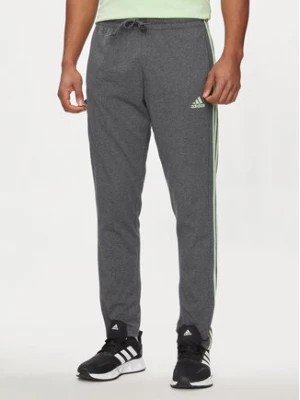 Zdjęcie produktu adidas Spodnie dresowe Essentials IS1367 Szary Regular Fit