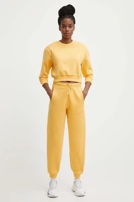 Zdjęcie produktu adidas spodnie dresowe kolor żółty gładkie IW1284