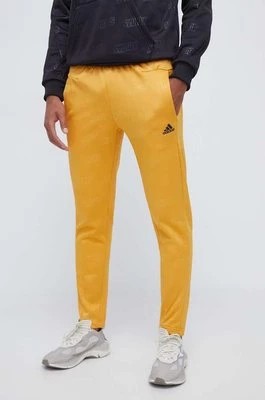Zdjęcie produktu adidas spodnie dresowe kolor żółty wzorzyste