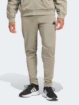 Zdjęcie produktu adidas Spodnie dresowe Tiro IS1504 Zielony Regular Fit