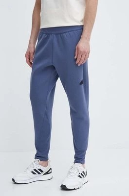 Zdjęcie produktu adidas spodnie dresowe Z.N.E kolor niebieski gładkie IR5205