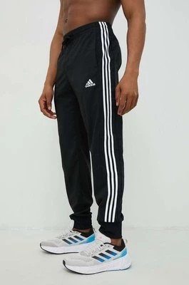 Zdjęcie produktu adidas spodnie treningowe męskie kolor czarny z aplikacją IC0041