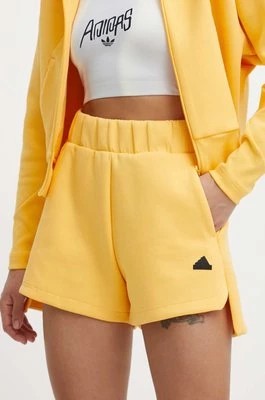 Zdjęcie produktu adidas szorty Z.N.E damskie kolor żółty z nadrukiem high waist IS3927
