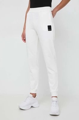 Zdjęcie produktu Armani Exchange spodnie dresowe bawełniane kolor beżowy gładkie 3DYP91 YJFDZ