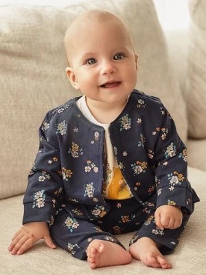 Zdjęcie produktu Bawełniane spodnie niemowlęce - granatowe w kwiatki 5.10.15.