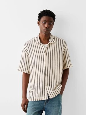 Zdjęcie produktu Bershka Koszula W Strukturalne Paski Z Krótkim Rękawem Mężczyzna Biały / Czarny