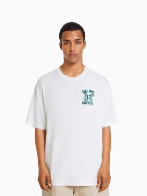 Zdjęcie produktu Bershka Koszulka Boxy Fit Z Krótkim Rękawem I Nadrukiem Mężczyzna Biały