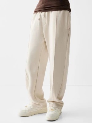 Zdjęcie produktu Bershka Pluszowe Spodnie O Kroju Wide Leg Mężczyzna Biały Złamany