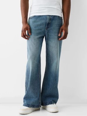 Zdjęcie produktu Bershka Spodnie Jeansowe Dzwony Baggy Mężczyzna Wyblakły Niebieski