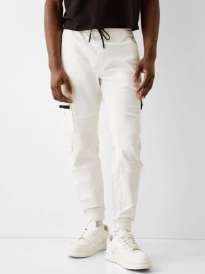 Zdjęcie produktu Bershka Spodnie Jogger Cargo Slim Mężczyzna Biały Złamany