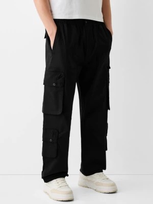 Zdjęcie produktu Bershka Spodnie Wide Leg Multicargo Mężczyzna Czarny