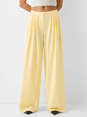 Zdjęcie produktu Bershka Spodnie Wide Leg Z Zakładkami Kobieta Żółty