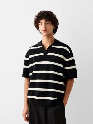Zdjęcie produktu Bershka Strukturalna Koszulka Polo W Paski I Z Krótkim Rękawem Mężczyzna Czarny