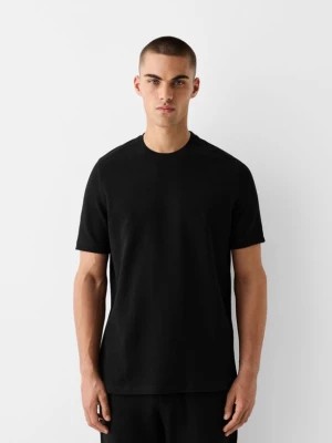 Zdjęcie produktu Bershka Teksturowana Koszulka Z Krótkim Rękawem Mężczyzna Czarny