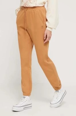 Zdjęcie produktu Billabong spodnie dresowe kolor brązowy gładkie