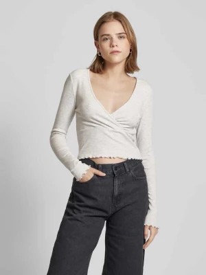 Zdjęcie produktu Bluzka krótka w kopertowym stylu z długim rękawem model ‘LINA’ Only