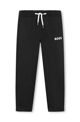 Zdjęcie produktu BOSS spodnie dresowe dziecięce kolor czarny gładkie