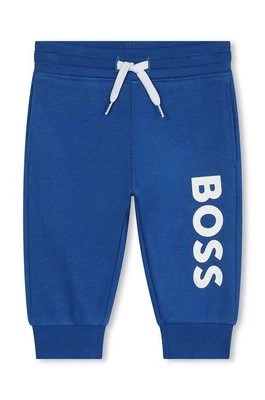 Zdjęcie produktu BOSS spodnie dresowe niemowlęce kolor niebieski z nadrukiem