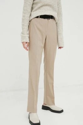 Zdjęcie produktu Bruuns Bazaar spodnie damskie kolor beżowy proste high waist