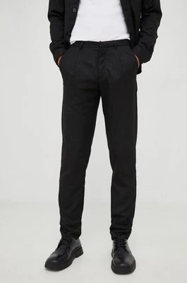 Zdjęcie produktu Bruuns Bazaar spodnie męskie kolor czarny dopasowane