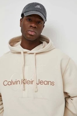 Zdjęcie produktu Calvin Klein Jeans bluza bawełniana męska kolor beżowy z kapturem z aplikacją