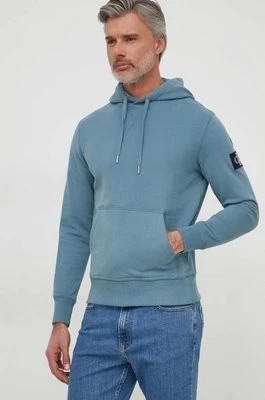 Zdjęcie produktu Calvin Klein Jeans bluza bawełniana męska kolor niebieski z kapturem z aplikacją