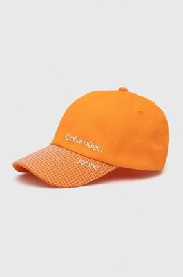 Zdjęcie produktu Calvin Klein Jeans czapka z daszkiem bawełniana dziecięca kolor pomarańczowy wzorzysta