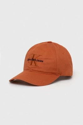 Zdjęcie produktu Calvin Klein Jeans czapka z daszkiem bawełniana kolor pomarańczowy z aplikacją