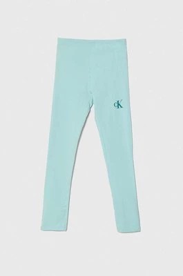 Zdjęcie produktu Calvin Klein Jeans legginsy dziecięce kolor turkusowy z nadrukiem