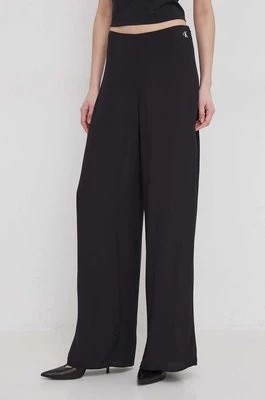 Zdjęcie produktu Calvin Klein Jeans spodnie damskie kolor czarny szerokie high waist